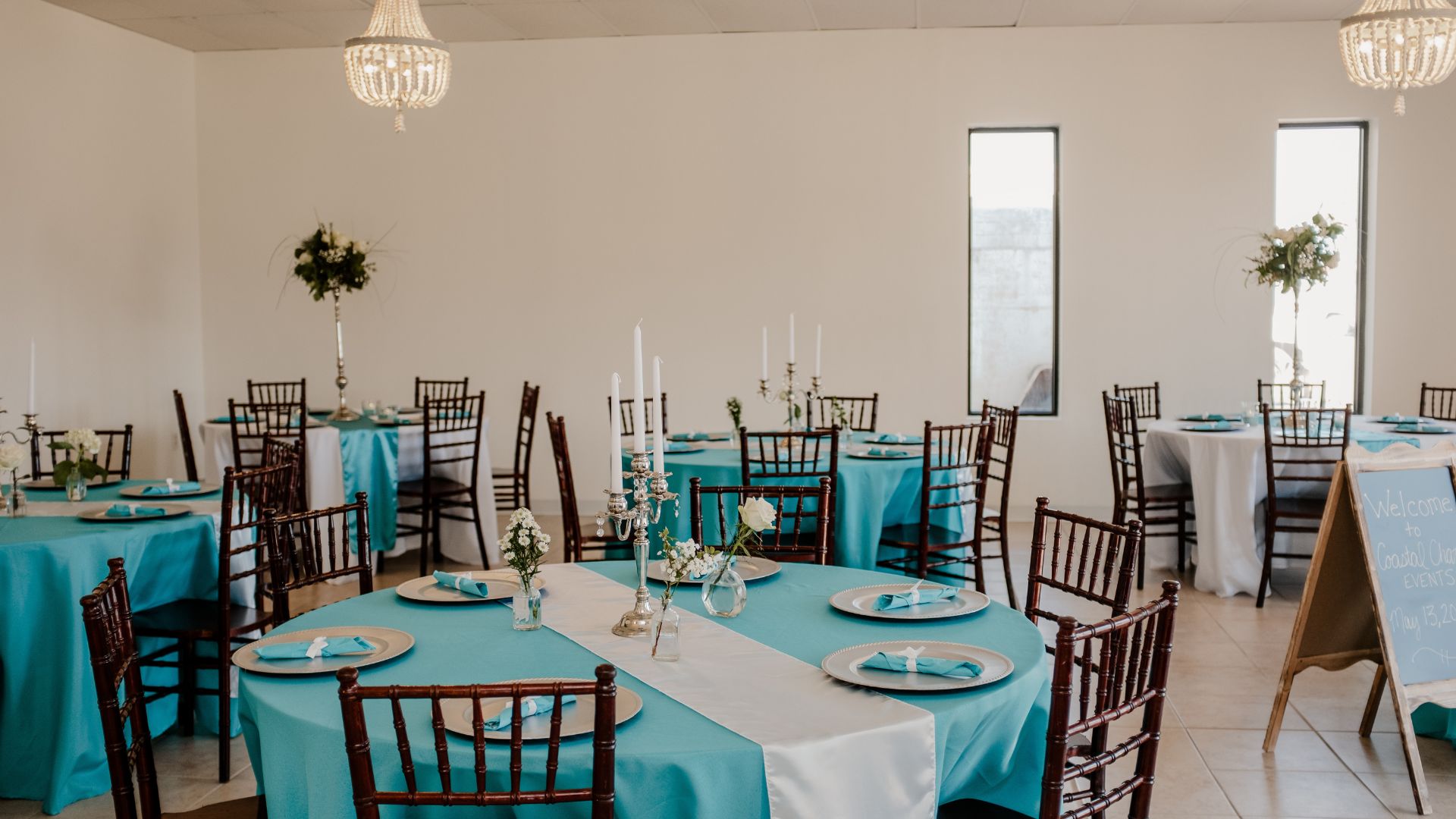 teal and white wedding reception with candelabras corpus christi wedding planner