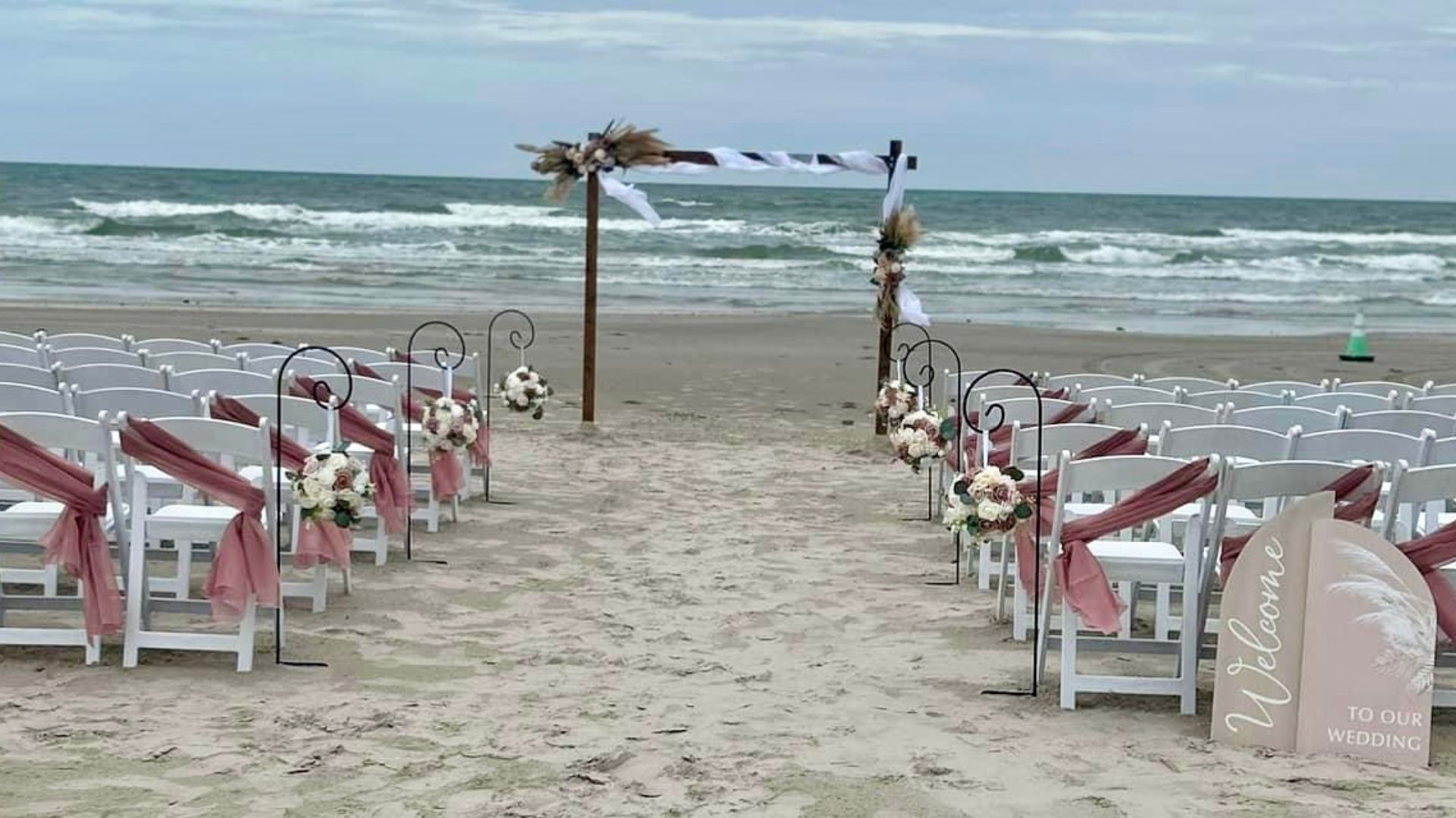 Beach wedding dusty rose boho arch