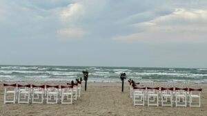 red and white holiday beach wedding