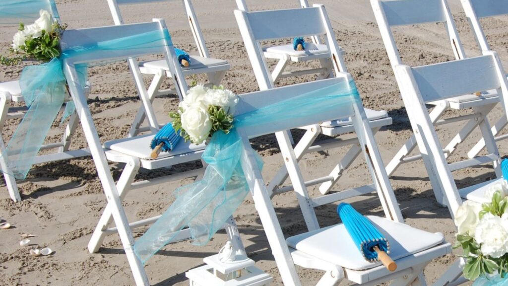 sun umbrellas to keep guests comfortable at a beach wedding